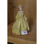 A ROYAL WORCESTER FIGURE TITLED GRANDMOTHERS DRESS