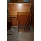 A TEAK BUREAU TOGETHER WITH A SMALL BOOKSHELF