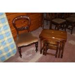 AN OAK NEST OF TABLES TOGETHER WITH A BALLOON BACK CHAIR