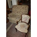 A PARKER KNOLL TWO SEATER SOFA TOGETHER WITH A REPRODUCTION ARM CHAIR
