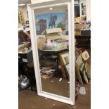 A LARGE IKEA FLOOR STANDING MIRROR