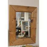 A PINE FRAMED MIRROR