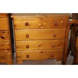 A PINE FOUR DRAWER CHEST OF DRAWERS