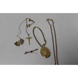 A 9ct GOLD HEART LOCKET AND CHAIN TOGETHER WITH A 9ct GOLD CRUCIFIX AND CHAIN, ANOTHER 9ct GOLD