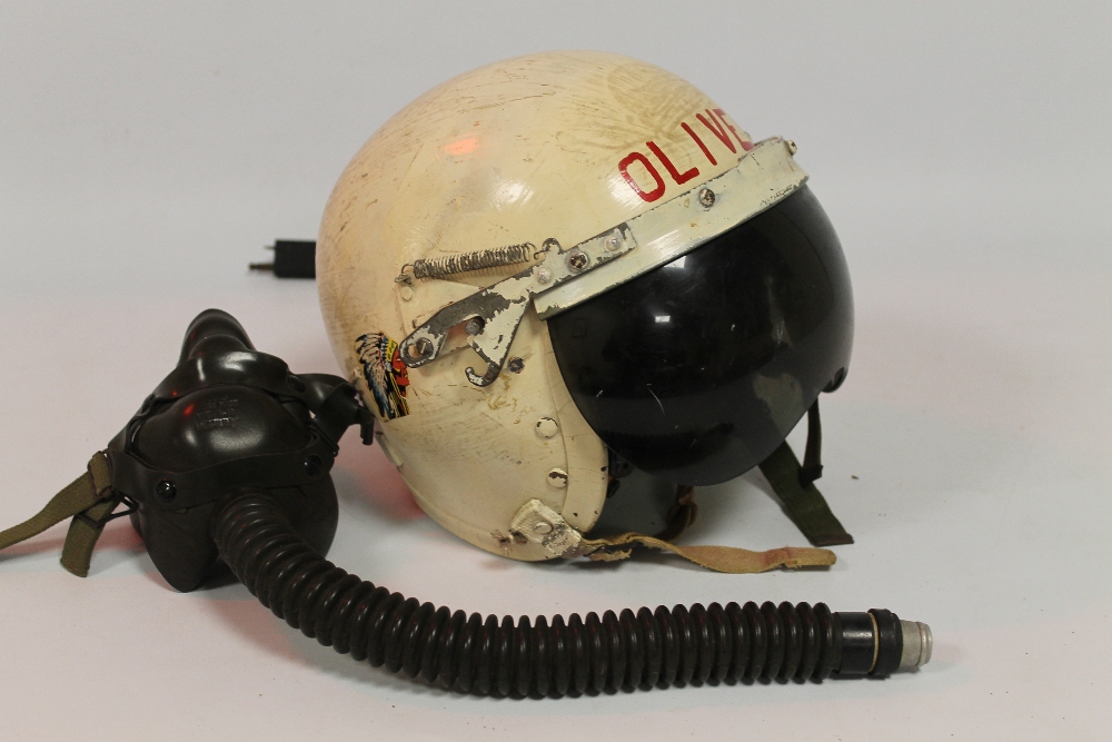 A VINTAGE US AIR FORCE "P1-a" FLYING HELMET AND FACE MASK, skull cap with later paint and name 'Oli