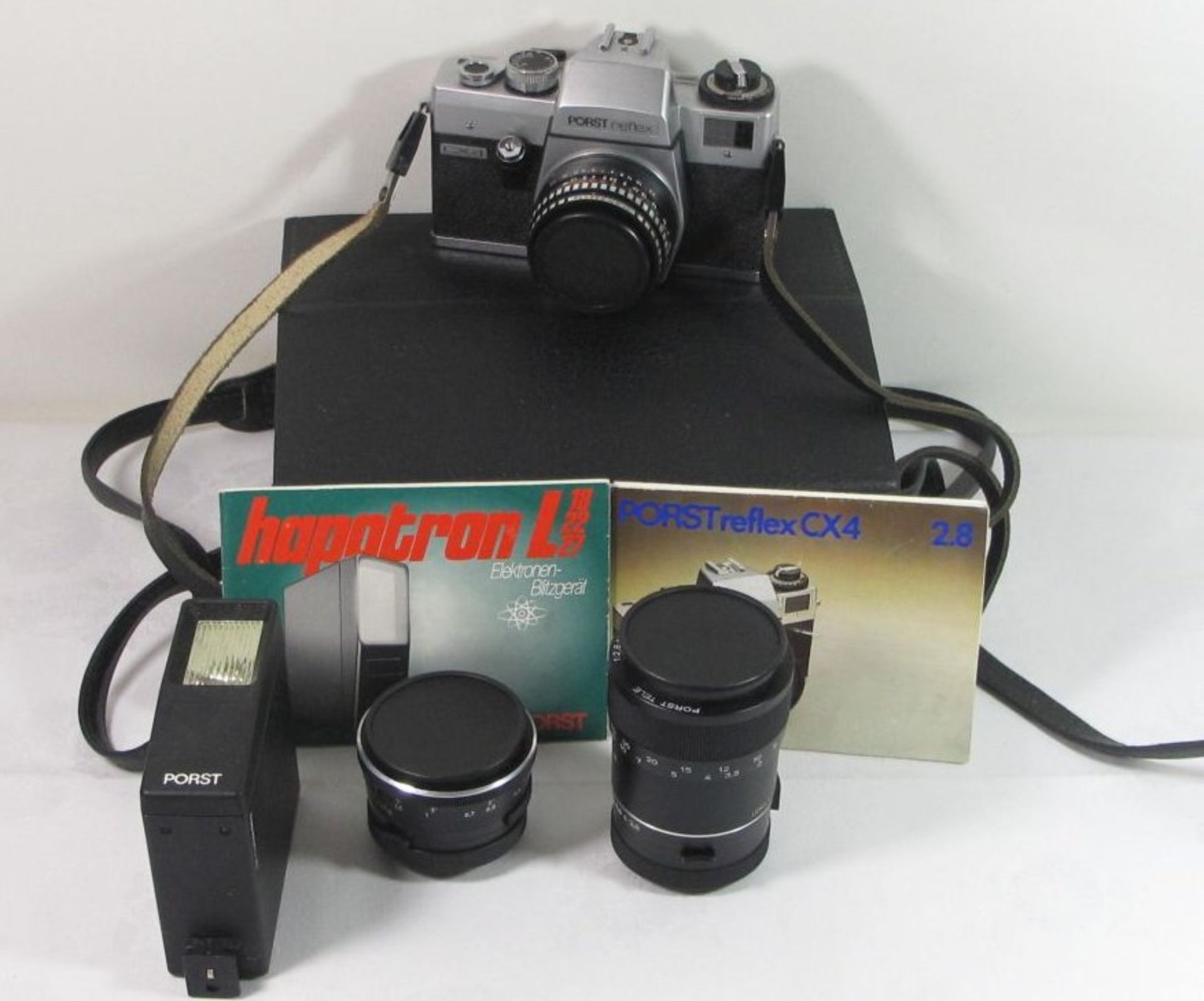 Fotoapparat "Porst Reflex CX 4" anbei 2 Objektive und Blitz, in Tasche. Funktion nicht geprüf