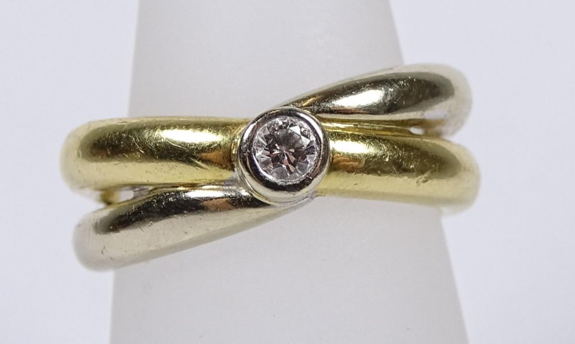 Solitär-Bicolor-Goldring, GG 750/000,dieser 0,10ct.,9,08gr., RG 5