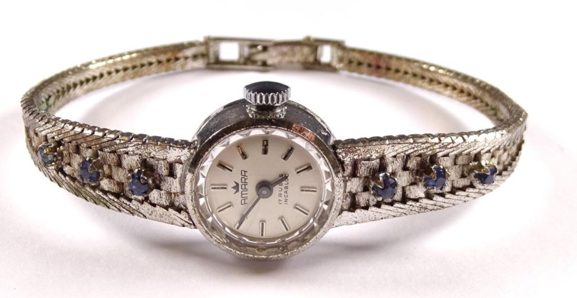 Damen Armbanduhr,"Amara",Handaufzug,Werk steht,Silber -835- besetzt mit Saphiren,ges.gew.20,8gr.