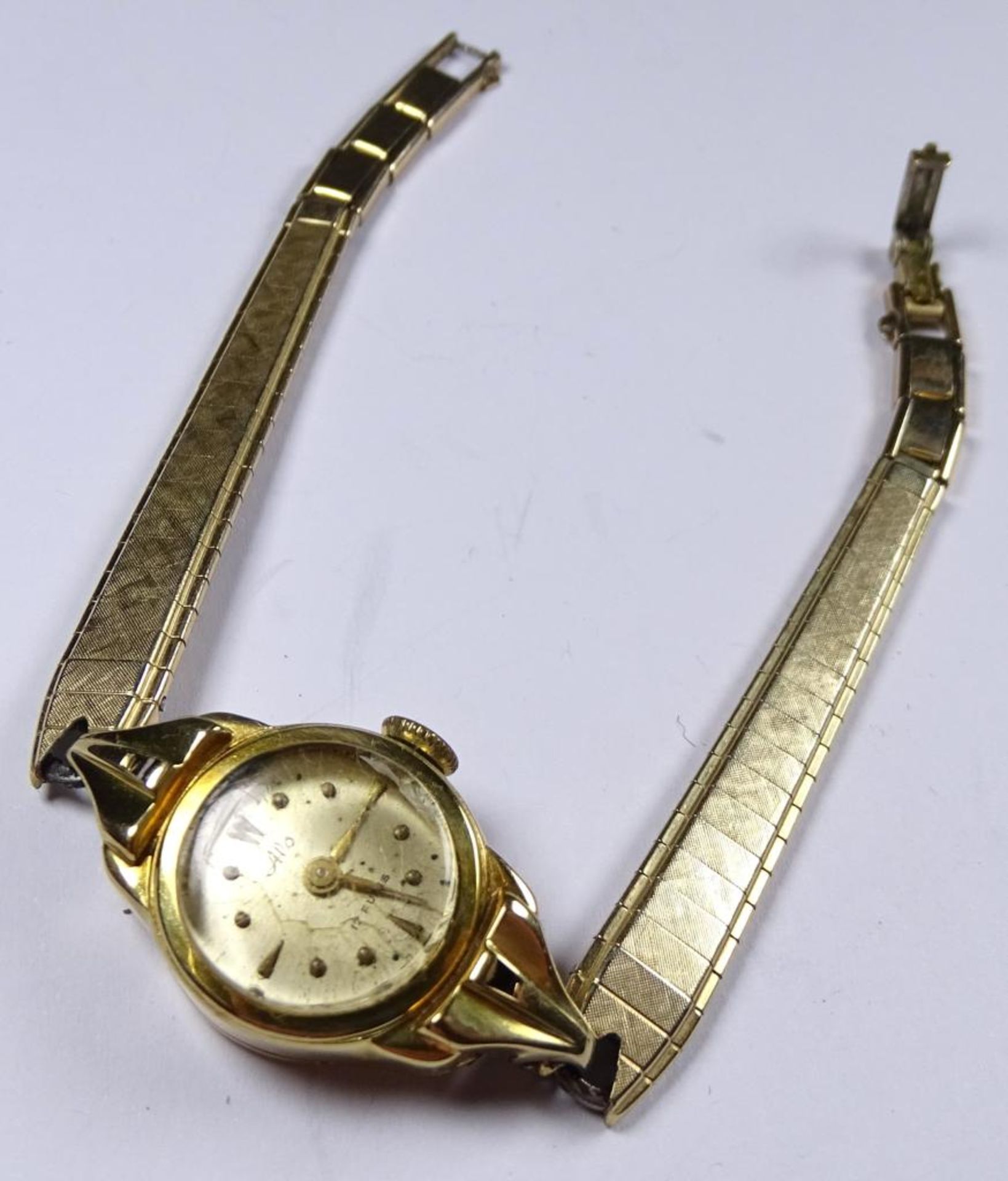 Damen Armbanduhr,Goldgehäuse -585-,Handaufzug,Werk läuf