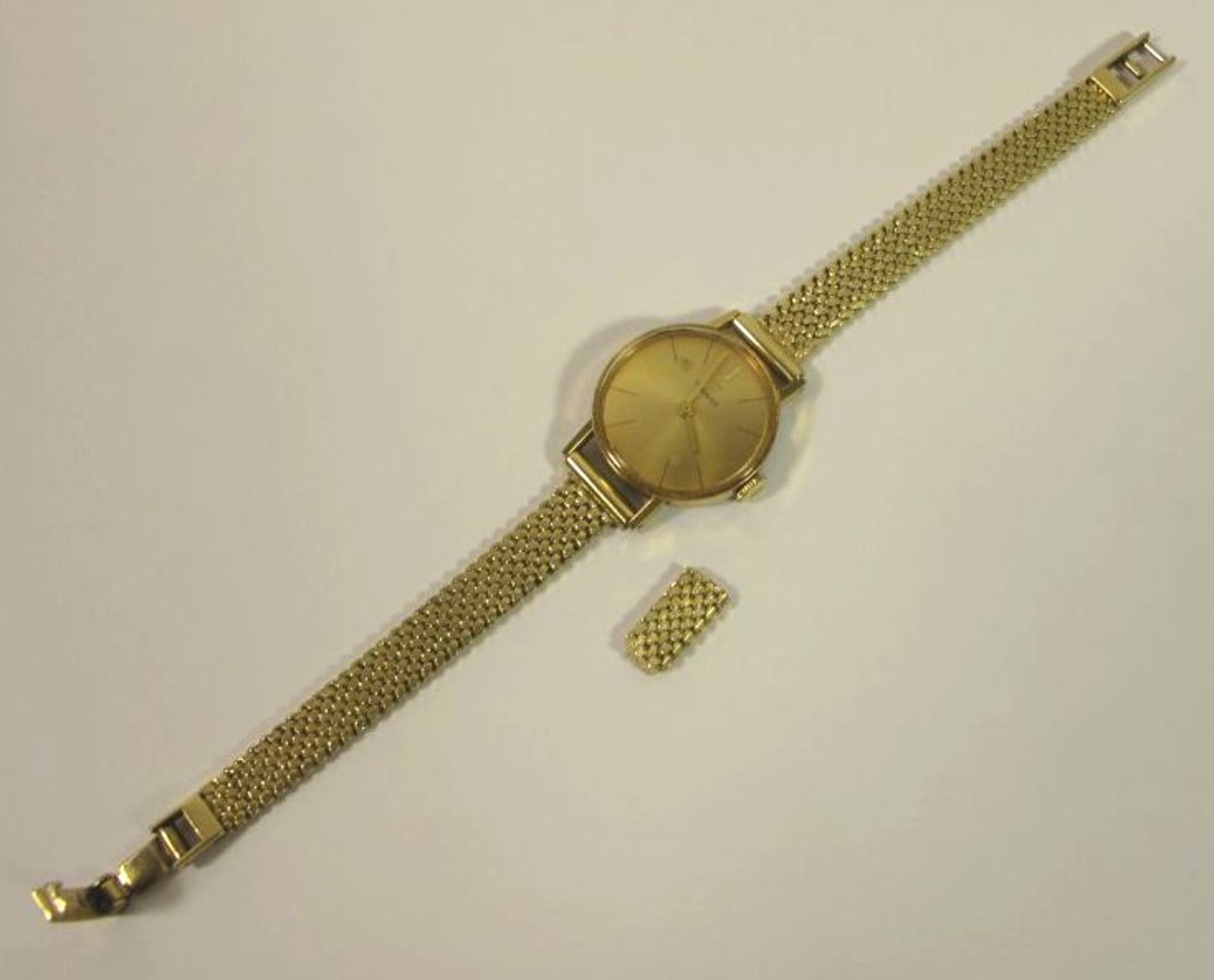DAU "Tissot", 585er GG Armband, Werk läuft, Tragespuren, anbei Stück vom Armband, komplett 27,7g,