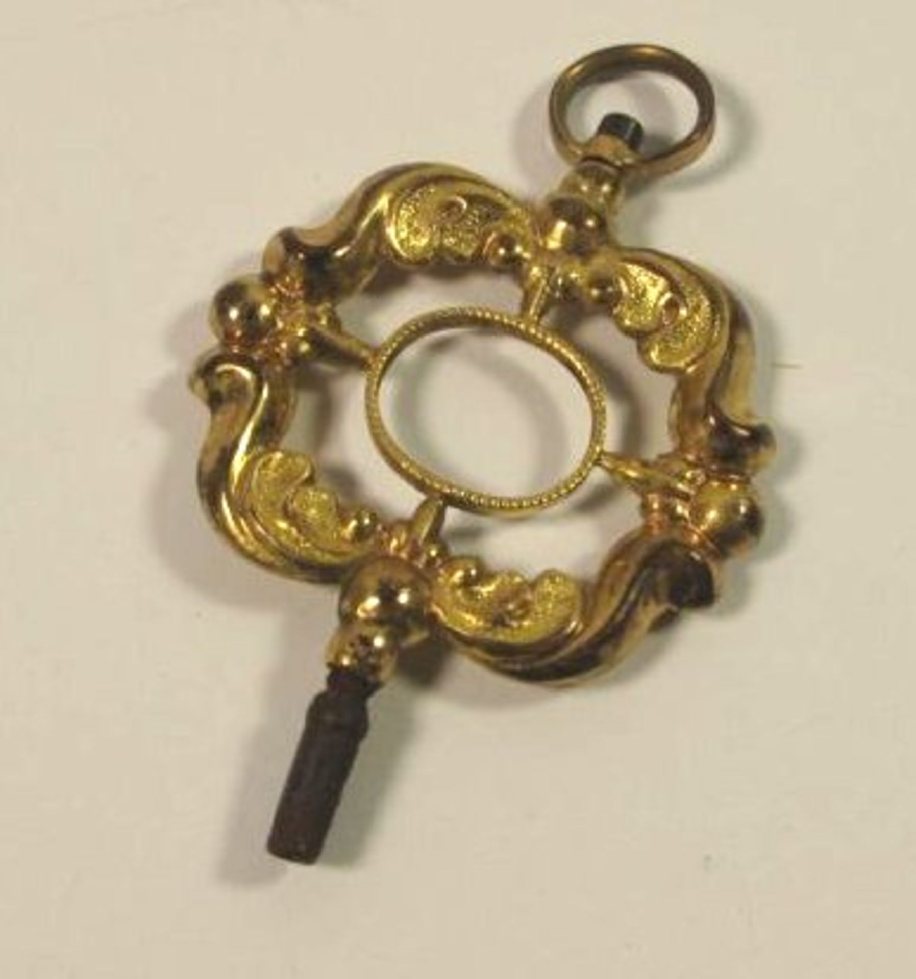 Prunk-Uhrenschlüssel, 19. Jhd., Schaumgold, Alters-u. Gebrauchsspuren, L-4,5cm.