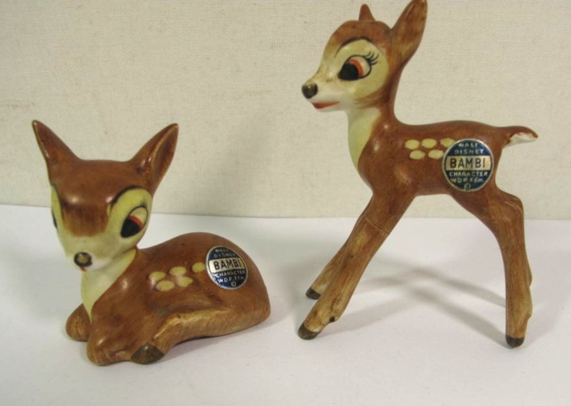 2x Goebel-Bambis, stehendes am Lauf geklebt, ca. H-8cm.