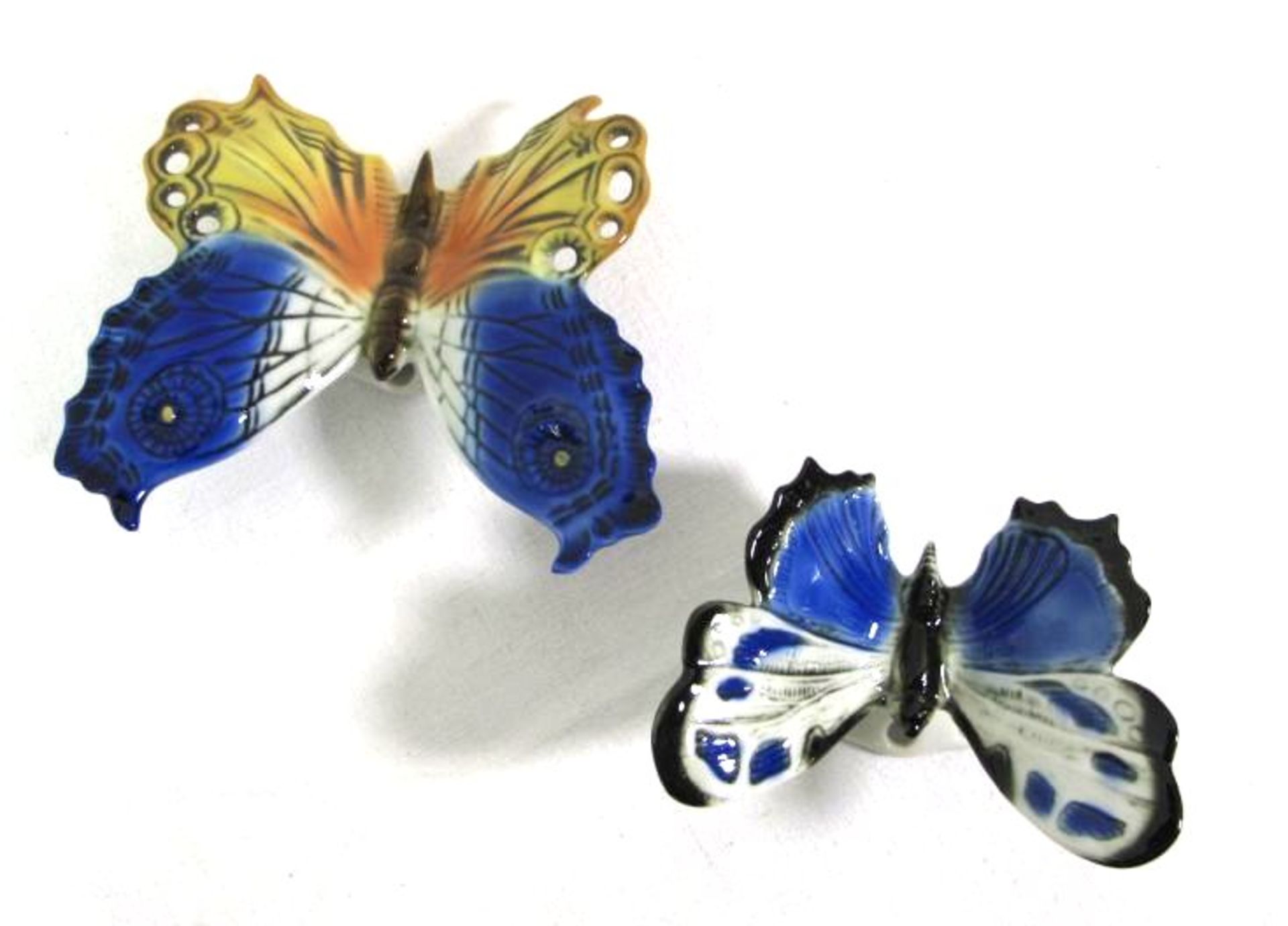 2x div. Schmetterlinge, 1x ENS und 1x Ankermarke ?, ca. H-4cm.