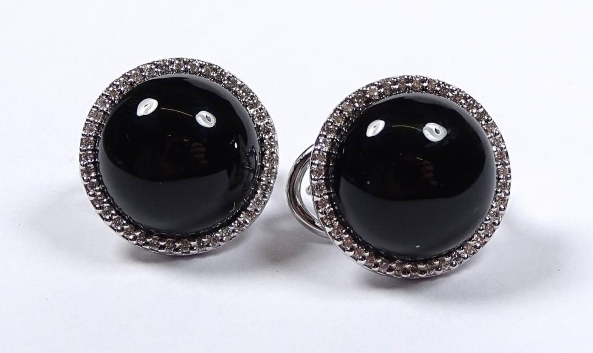 Paar Ohrringe,Weissgold 750er,Onyx und Brillanten,d-15,5mm,ges.gew.12,1gr.