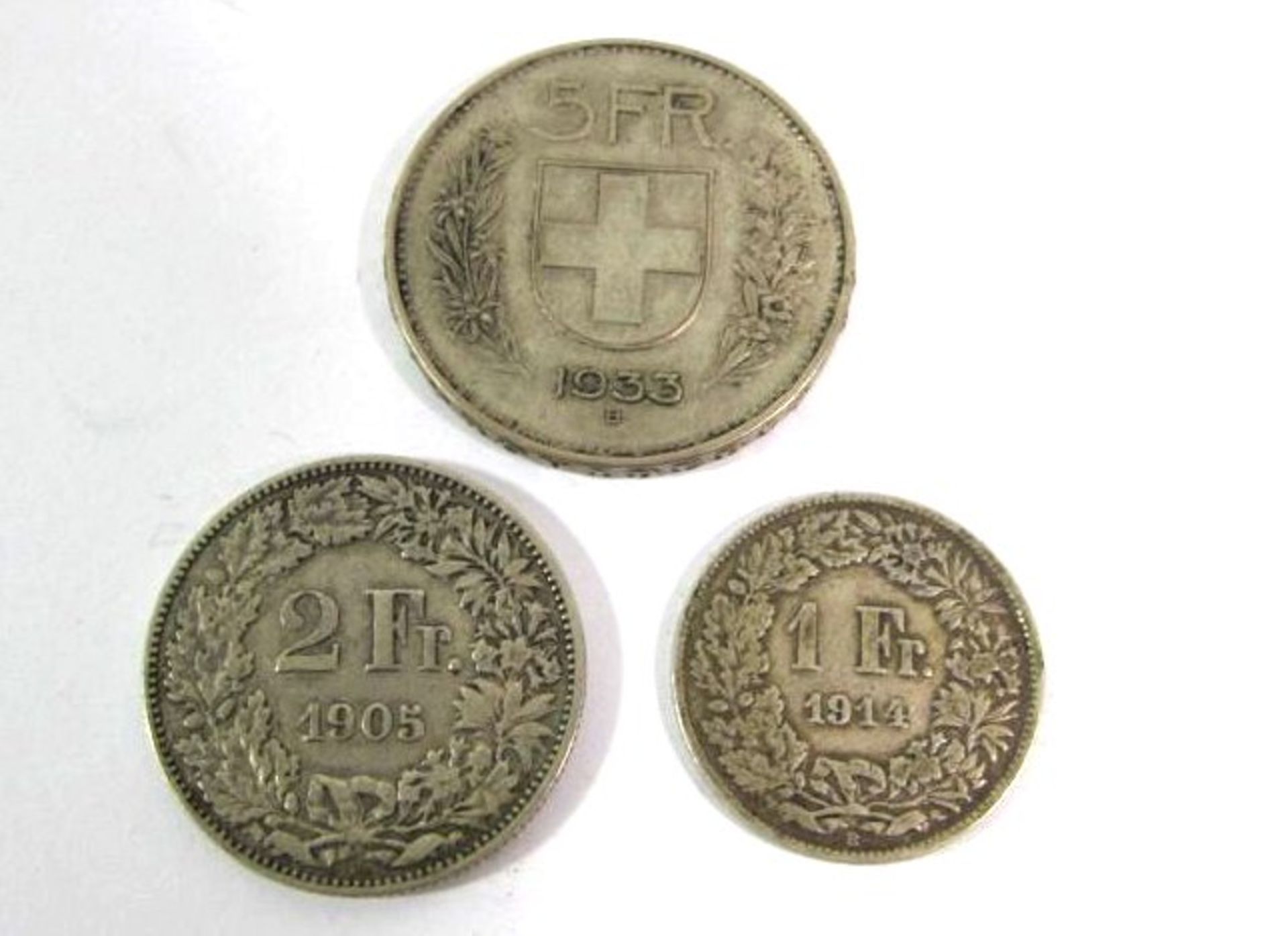 3x Münzen, Schweiz, 1 Franken 1914, 2 Franken 1905 und 5 Franken 1933, zus. 29,6g.