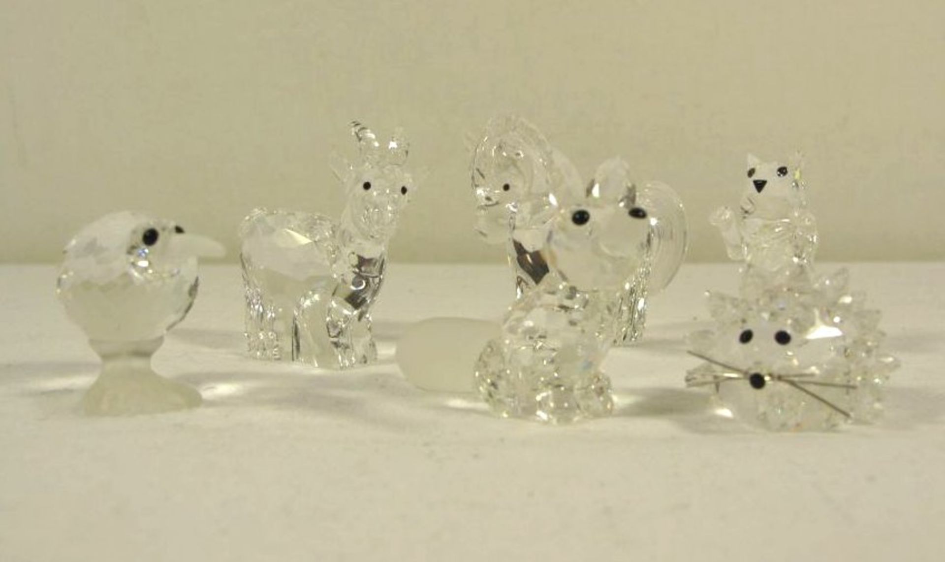 6x div. Swarovski-Tiere, Vogel, Pferd, Ziege, Fuchs, Igel und Katze diese beschädigt, ca. H-4cm.