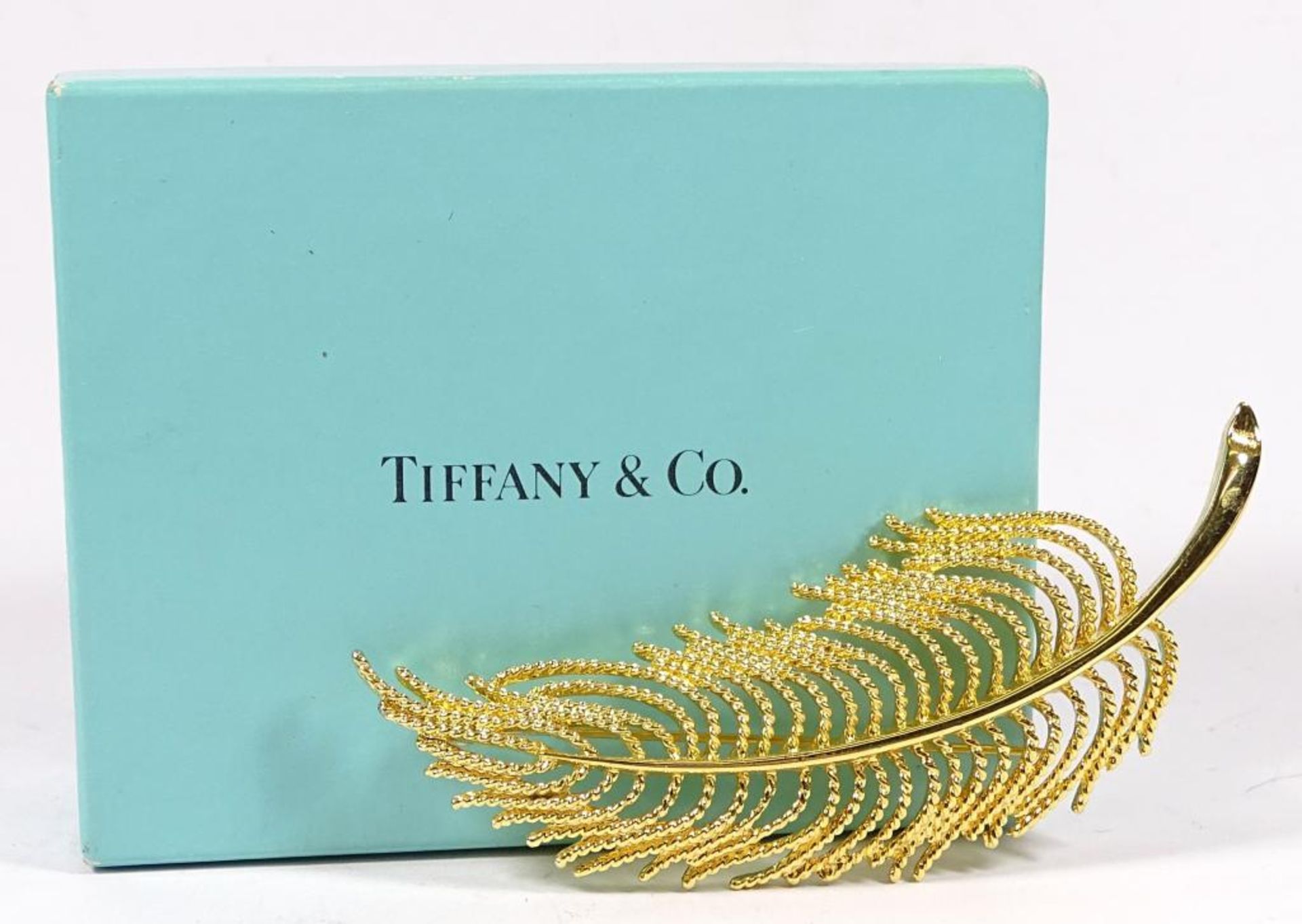 Tiffany & Co.Schachtel,mit einer Brosche von MONET,vergoldet,L- 9,1cm,Schachtel 94x74x34mm