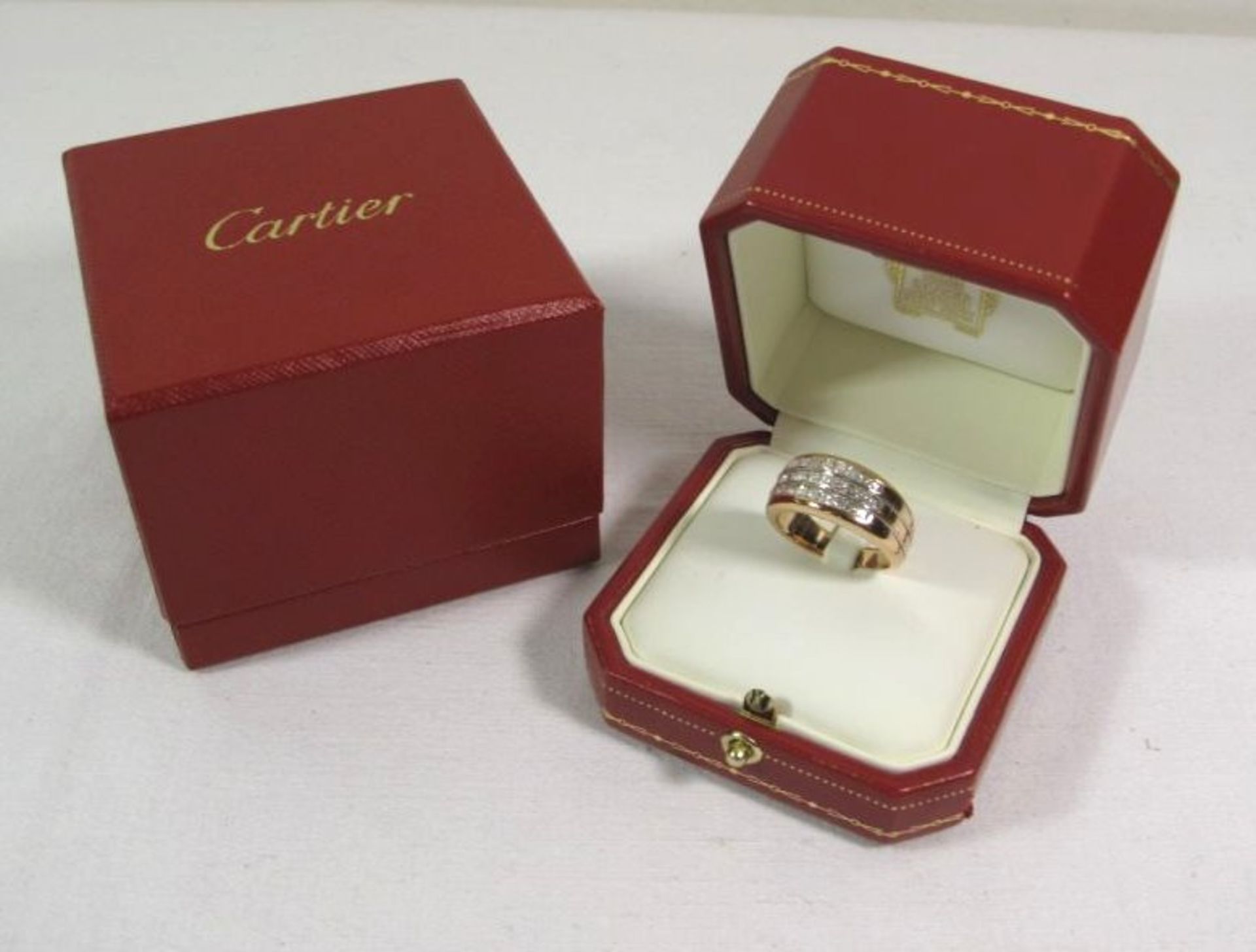 schöner Ring "Cartier", Boréal, 750er Roségold mit 25 Brillanten zus. 1,65ct, ca. 10,1g, Ringgr. 60,