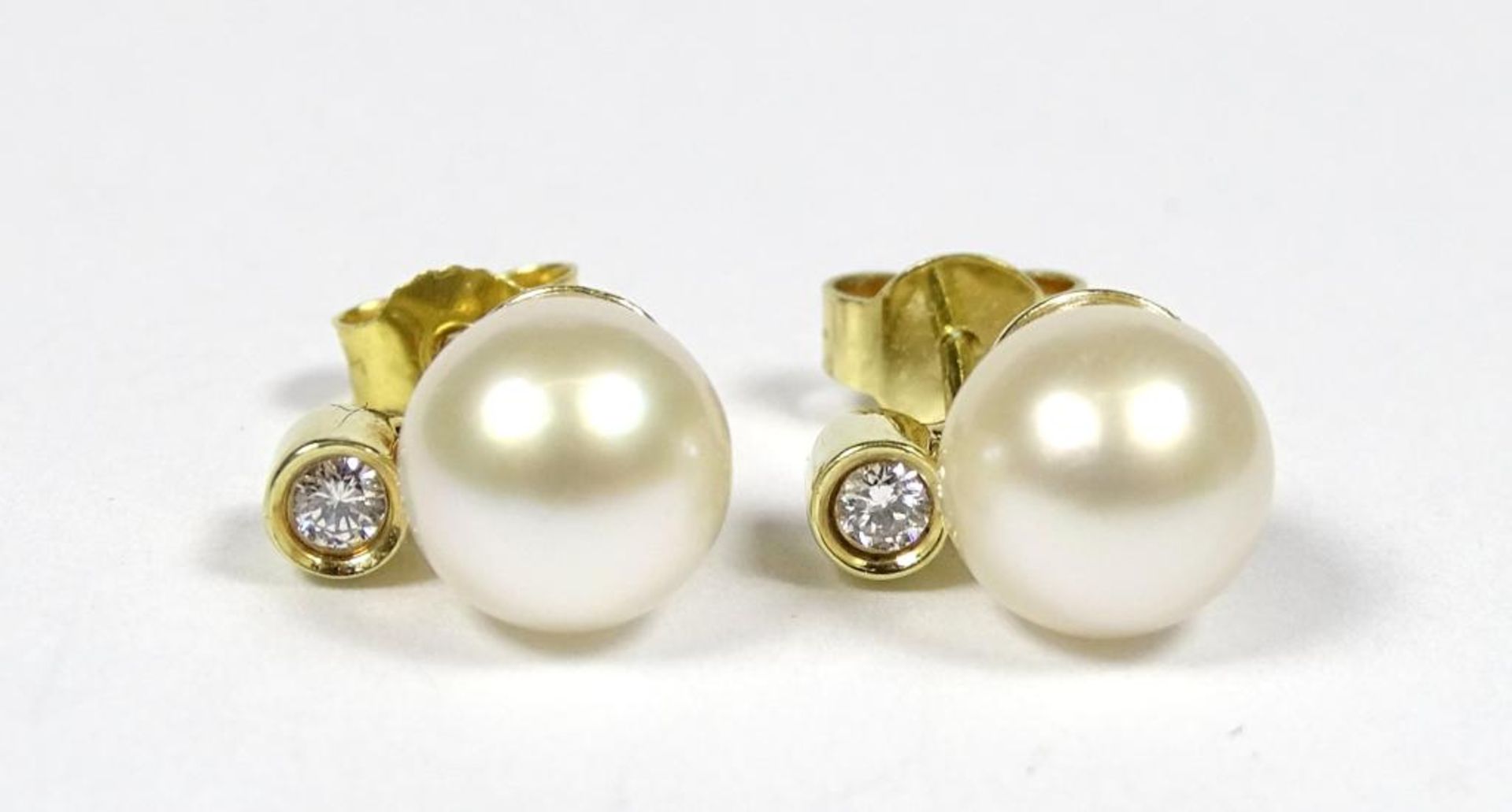 Paar Ohrstecker,Gold 585er,Perlen und Brillanten,d-7,5mm,ges.Gew.2,89gr.