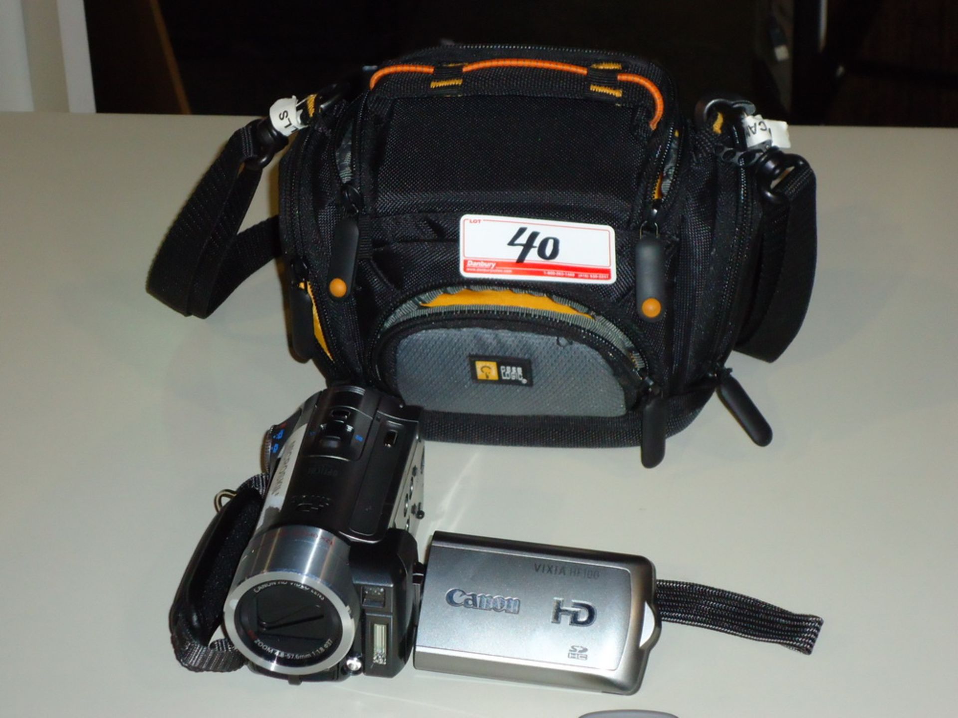 CANON VIXIA HF100 HD CAMCORDER W/ BATTERY, REMOTE, & CAMERA BAG (NO CHARGER)