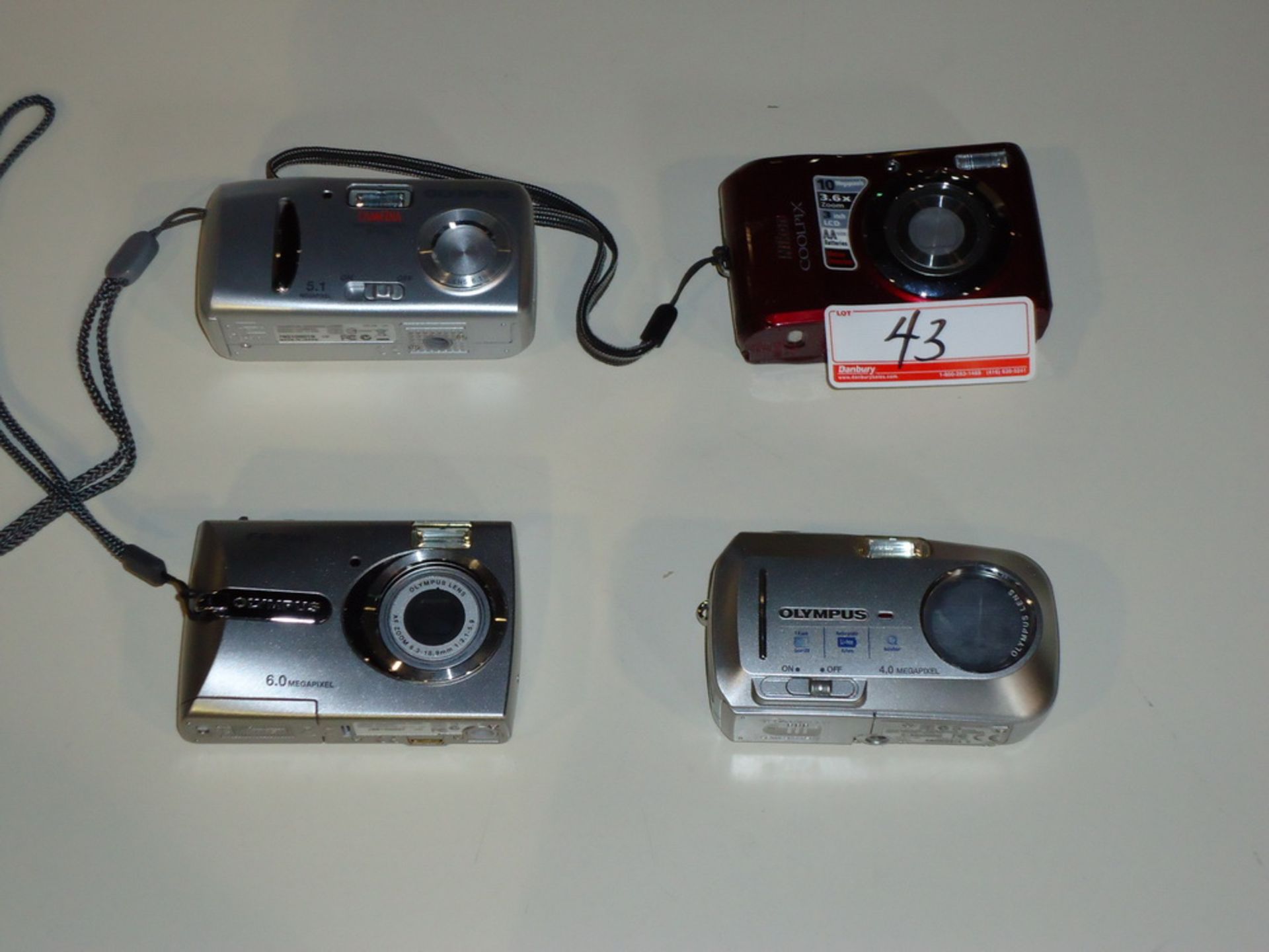 LOT - (4) CAMERAS - NIKON COOLPIX L20, (3) OLYMPUS DIGITAL CAMERAS