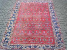 Großer turkmenischer Teppich roter Fond mit blauer Bordüre -Lebensbaumsymbole Benutzungsspuren,