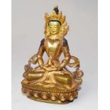 Medizin-Buddha, Tibet, 20. Jhd Bronze vergoldet, ziseliert und kaltbemalt, Verbödung aus dünnem