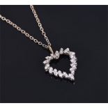 A white metal and diamond set open heart-shaped pendant the round cut stones of approx. 0.50