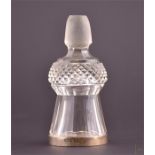 An early 20th century unusual lead cut glass thistle decanter stopper / combination spirit measure