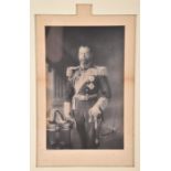 Framed three quarter length portrait of King George V (1865-1936) in full naval uniform dated 1911-