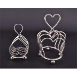A Sheffield silver four division heart-shaped toast rack, makers mark for Mappin & Webb. Weight, 3.