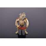 A cold painted bronze figure of a dog wearing a lifebelt. H: 8.5cm CONDITION REPORT The figurine