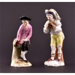 Two late 19th century Continental porcelain figures comprising a young man resting on a staff,