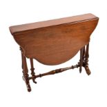 A Victorian walnut drop flap Sutherland table the shaped lozenge shaped top supported on turned