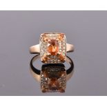 A yellow metal, diamond, and citrine cluster ring, of rectangular form, set oval and marquise cut