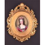 A 19th century enamel portrait miniature of Queen Anne wearing an ornate pink robe with enamel