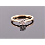 An 18 carat yellow gold and solitaire diamond ring set with round cut stone of approx. 0.50