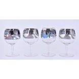 A fine set of Italian Art Deco enamelled glass goblets with black enamelled backgrounds decorated