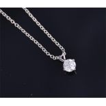 A 14 carat white gold mounted solitaire diamond pendant, the round cut stone of approx. 1.0 carat,