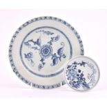 Two Tek Sing Cargo blue and white dishes a Magnolia Dish, and a Peony pattern plate, both with