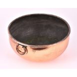 A large Victorian tin-lined copper egg beating bowl of circular form with brass handle, bears makers