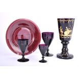 An early 20th century Austrian amethyst glass goblet, by Lorenze Brothers, Steinschonau, having