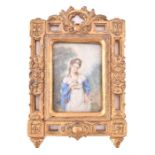 An early 20th century painted portrait miniature of a young lady in a blue robe, initialled RC, in a