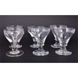 A near set of six Georgian pan top clear glass rummers with sloped sides and conical feet circa