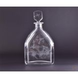 An Orrefors glass decanter by Edward Hald engraved with scenes of pheasants, of slab sided form,