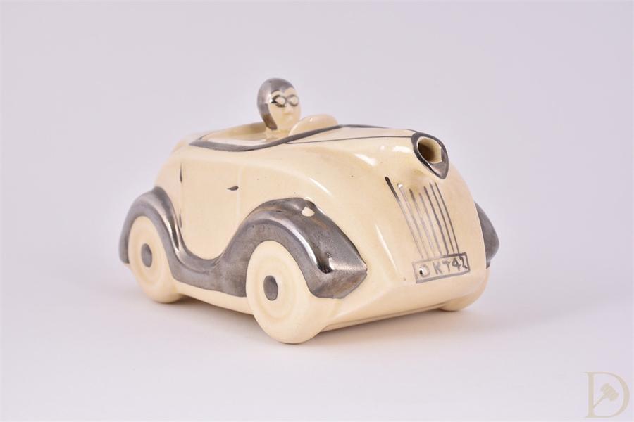 A Sadler novelty cream pottery racing car tea pot, number plate OK T42, with chrome painted - Image 3 of 5