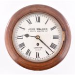 An early 20th century oak wall clock by John Walker, London the white enamel dial with black Roman