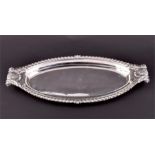 A George III silver snuffer tray  London 1815, by Paul Storr, of oval form, with gadroon rim and two