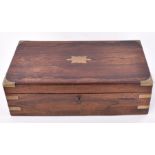 A Victorian brass and rosewood writing box with brown velvet interior, two inkwells and a key, 16 cm