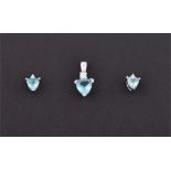 A 9ct white gold, diamond and apatite pendant set with a trillion cut sea green apatite of approx.